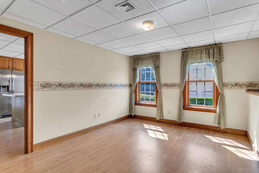 155 Orchard Road East Longmeadow, MA 01028 - Photo 33 of 42 an empty room with wooden floor and windows