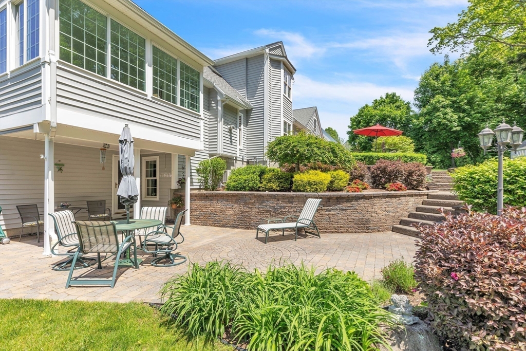 155 Orchard Road East Longmeadow, MA 01028 - Photo 39 of 42 a view of a patio with table and chairs and potted plants
