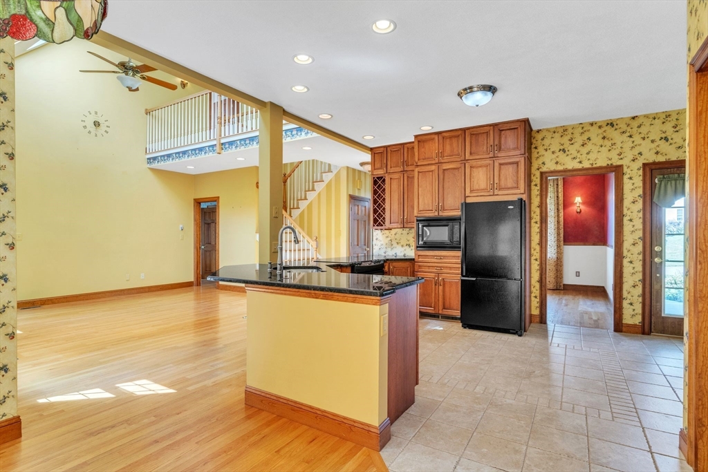 155 Orchard Road East Longmeadow, MA 01028 - Photo 7 of 42 a kitchen with stainless steel appliances granite countertop a refrigerator a stove and a sink