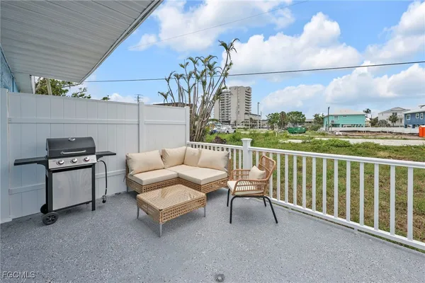 a workspace with furniture and a window