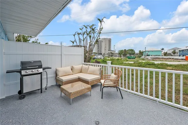 a workspace with furniture and a window