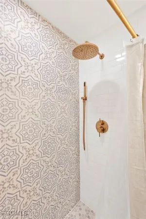 a view of a terrace with couches and pool