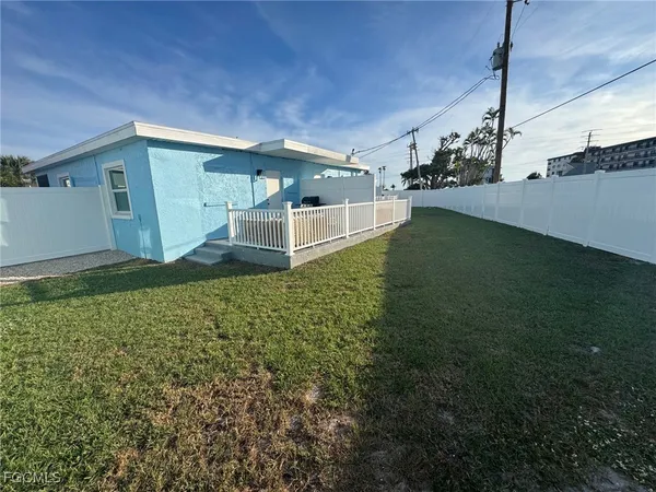 a room with workspace and a window