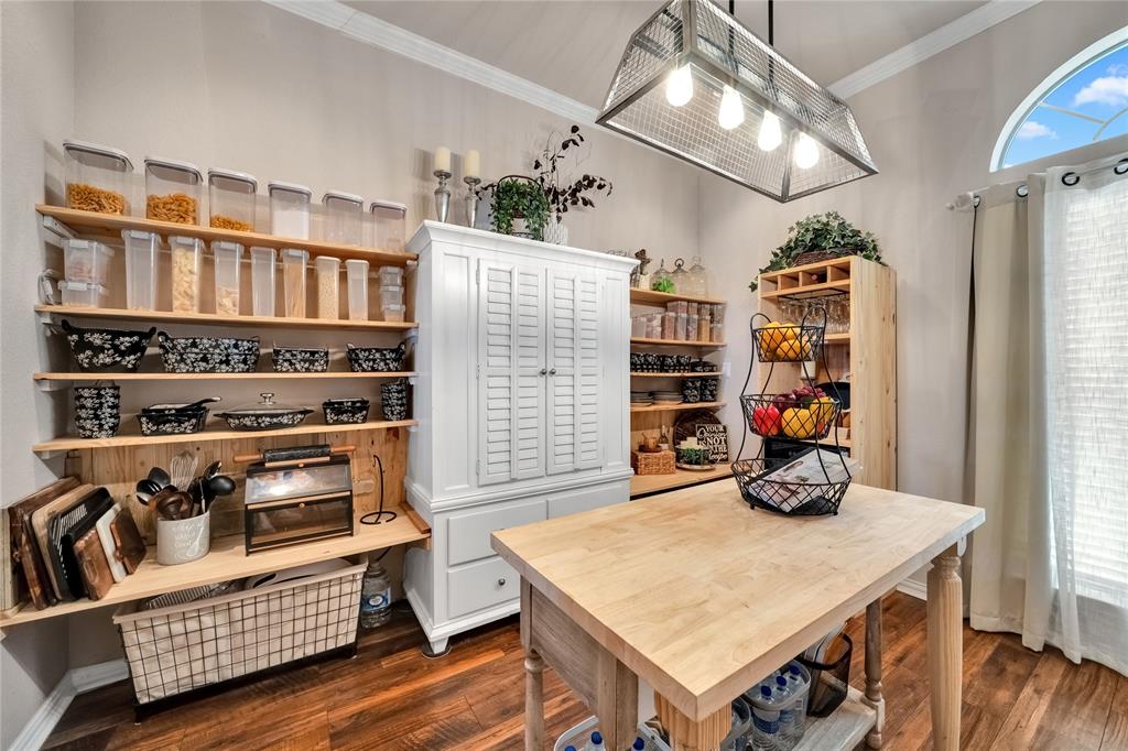 192 County Road 3133 Decatur, TX 76234 - Photo 11 of 35 a view of a workspace with furniture and toys