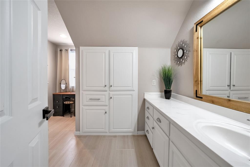 192 County Road 3133 Decatur, TX 76234 - Photo 26 of 35 a bathroom with a sink and a mirror