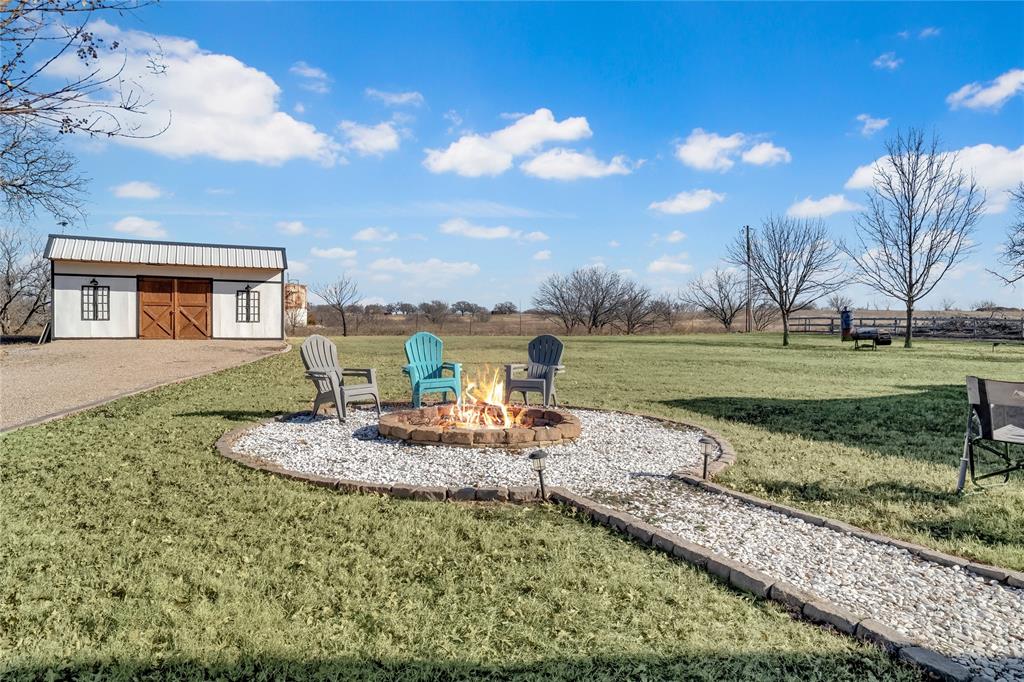 192 County Road 3133 Decatur, TX 76234 - Photo 28 of 35 a view of a house with a yard and sitting area