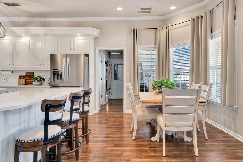 192 County Road 3133 Decatur, TX 76234 - Photo 9 of 35 a dining room with furniture and wooden floor