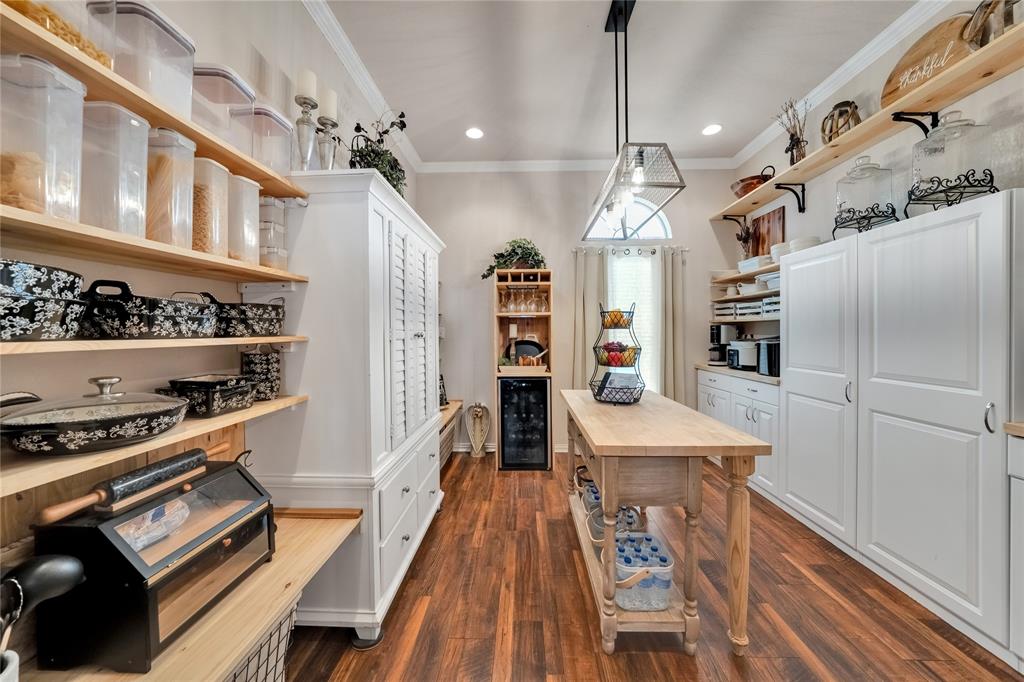 192 County Road 3133 Decatur, TX 76234 - Photo 10 of 35 a kitchen with stainless steel appliances granite countertop a stove and a refrigerator