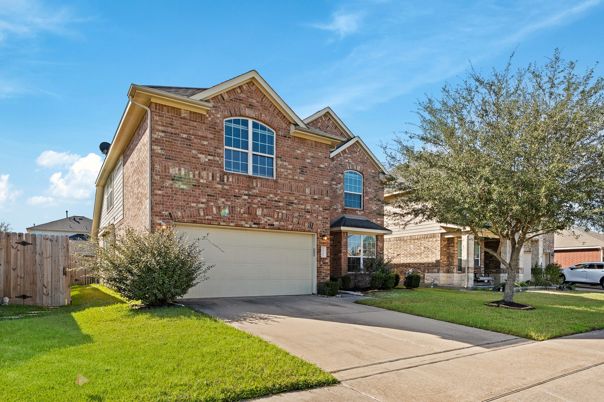 24735 Colonial Maple Drive Katy, TX 77493 - Photo 11 of 32 a front view of a house with a yard