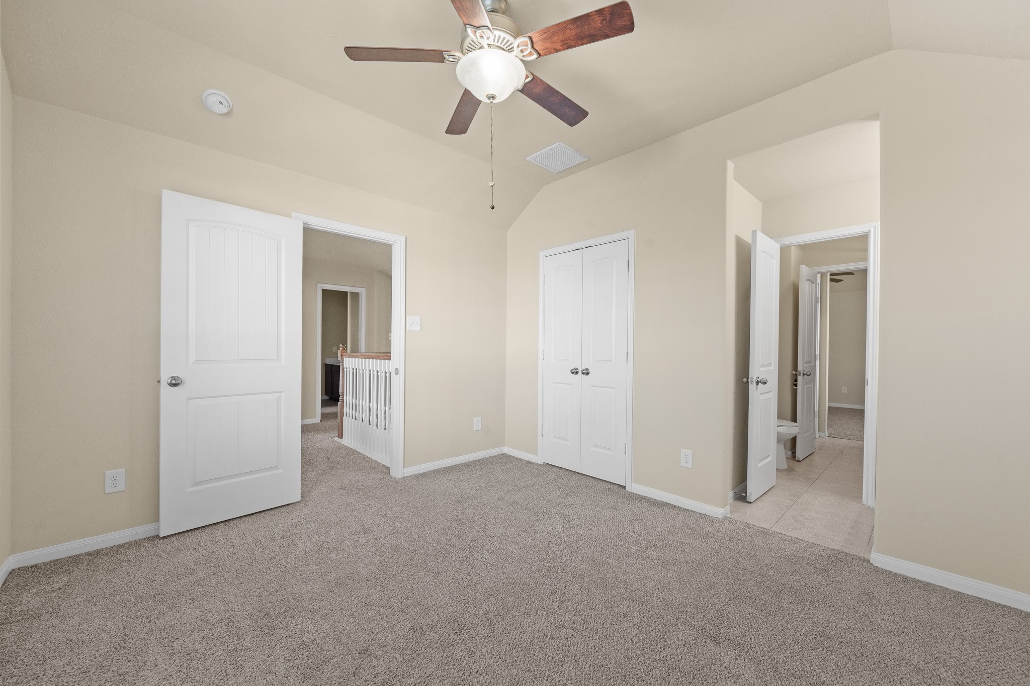 24735 Colonial Maple Drive Katy, TX 77493 - Photo 13 of 32 a view of an empty room and chandelier fan