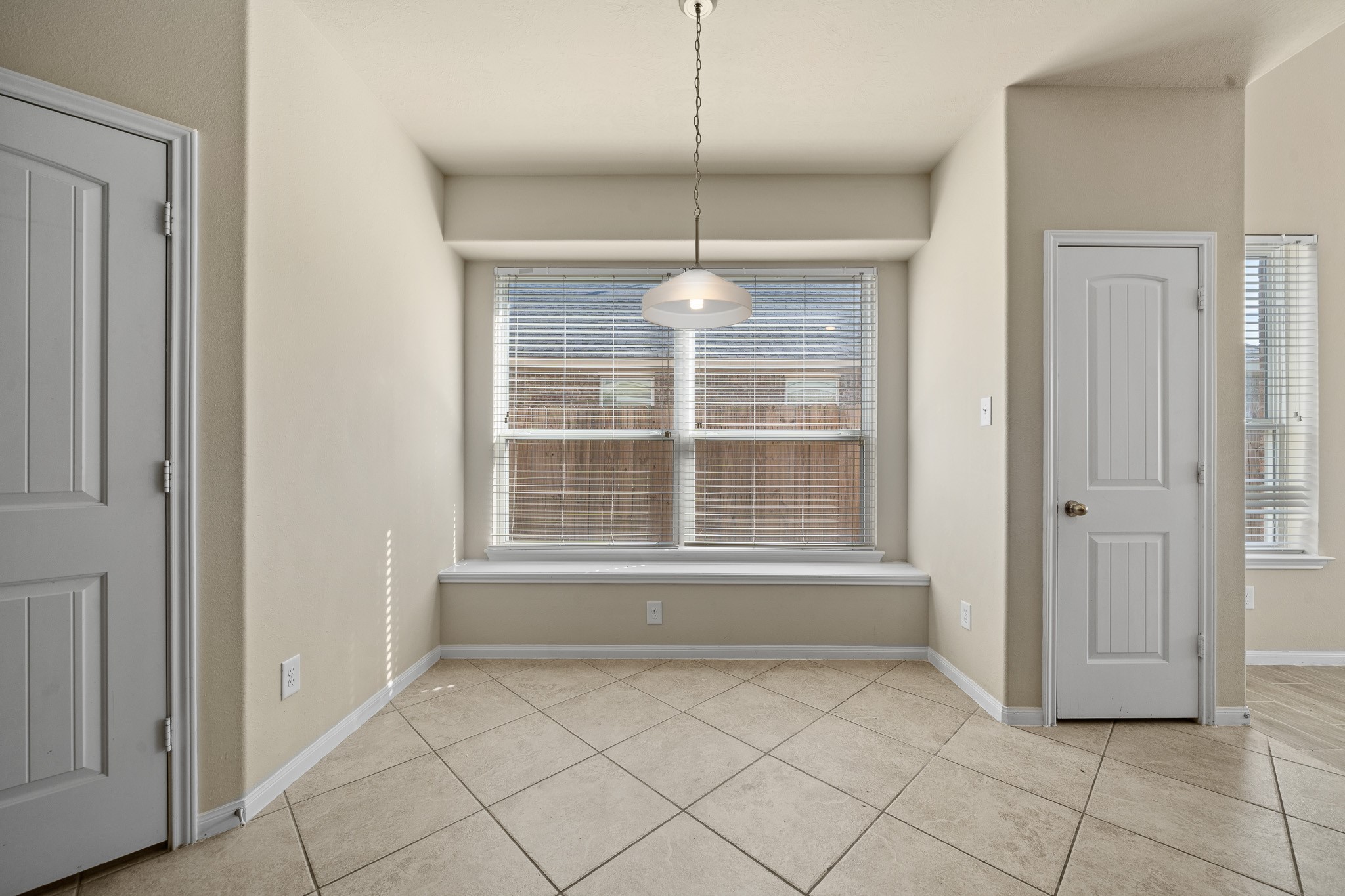 24735 Colonial Maple Drive Katy, TX 77493 - Photo 18 of 32 a view of an empty room with a window