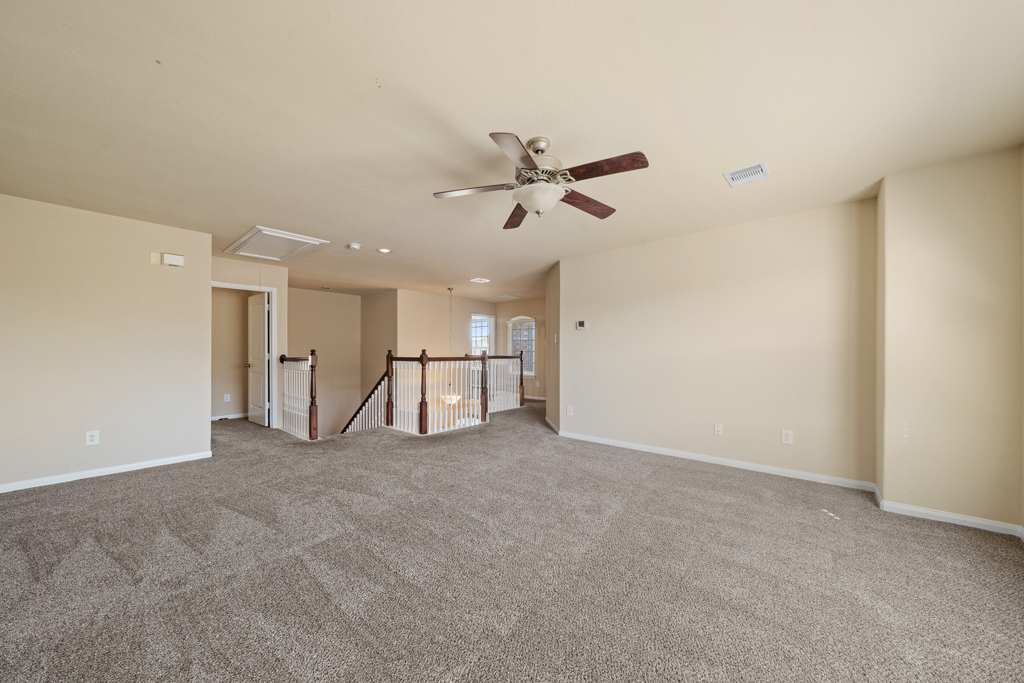 24735 Colonial Maple Drive Katy, TX 77493 - Photo 28 of 32 a view of a livingroom with a ceiling fan