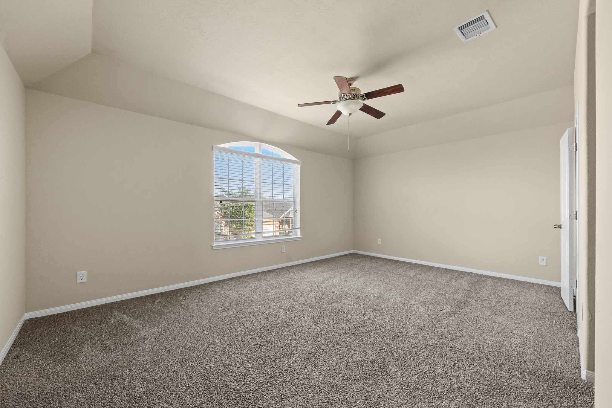 24735 Colonial Maple Drive Katy, TX 77493 - Photo 10 of 32 a view of room with a ceiling fan and window