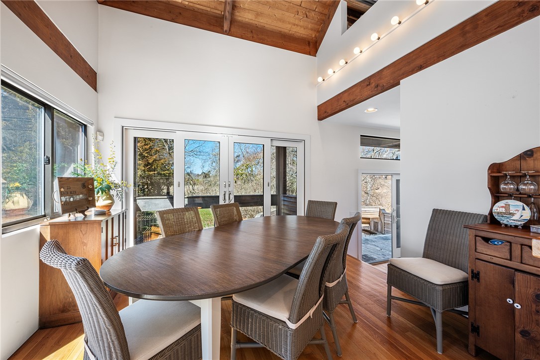 14 Round Hill Road Westerly, RI 02891 - Photo 19 of 35 Wide open dining area overlooking private yard and decks