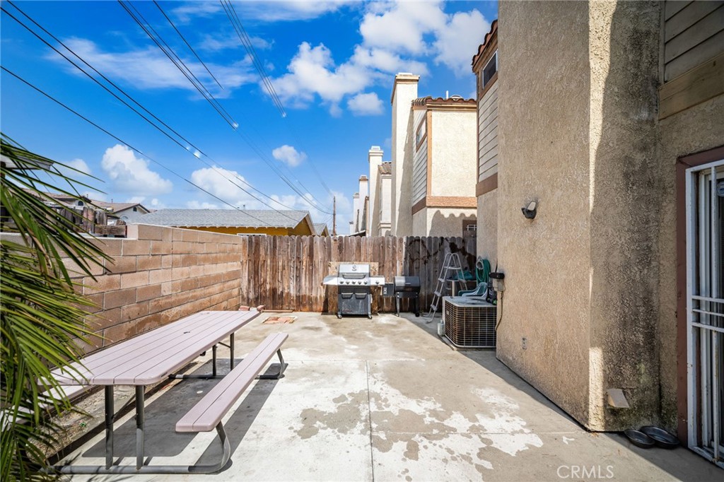 14134 Orizaba Avenue Paramount, CA 90723 - Photo 21 of 24 a view of a porch with chairs and ice snow