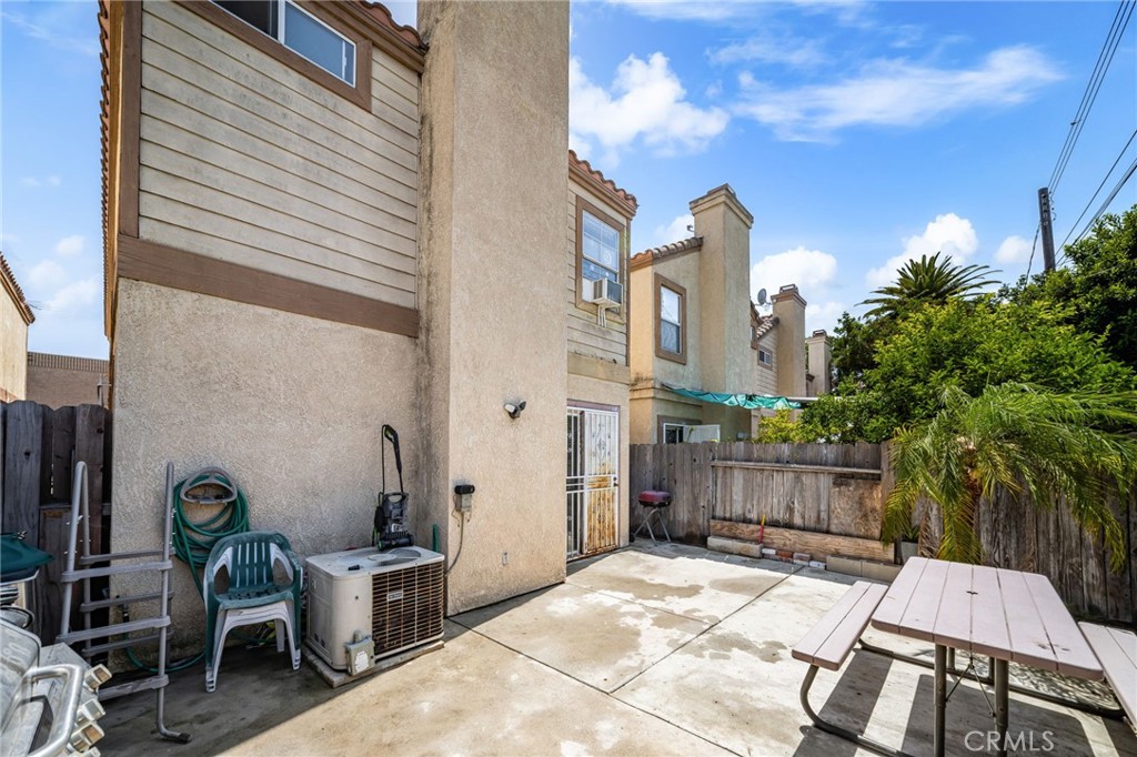 14134 Orizaba Avenue Paramount, CA 90723 - Photo 22 of 24 a backyard of a house with seating space