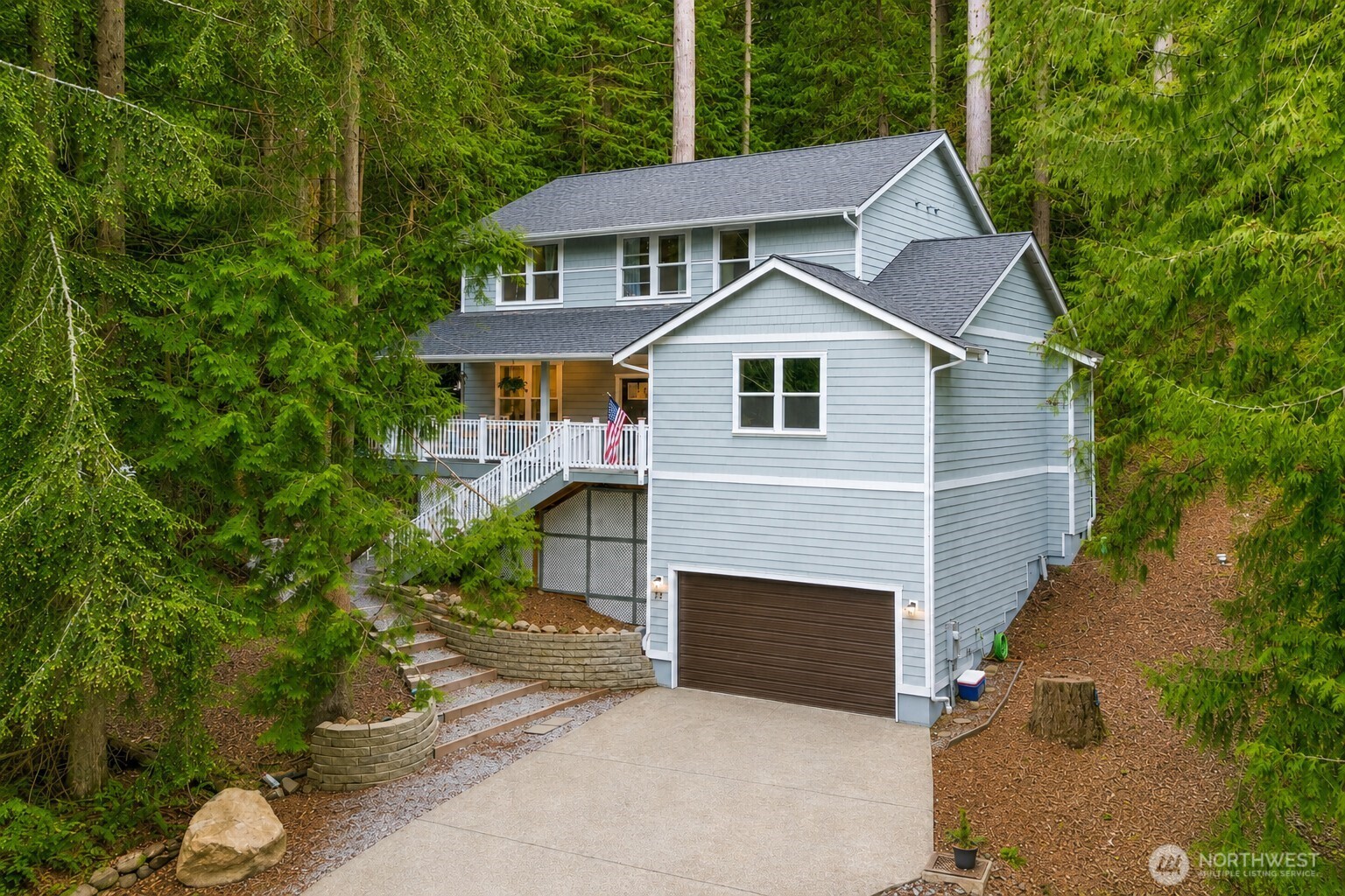 23 Spring Court Bellingham, WA 98229 - Photo 1 of 38 a front view of a house with garden