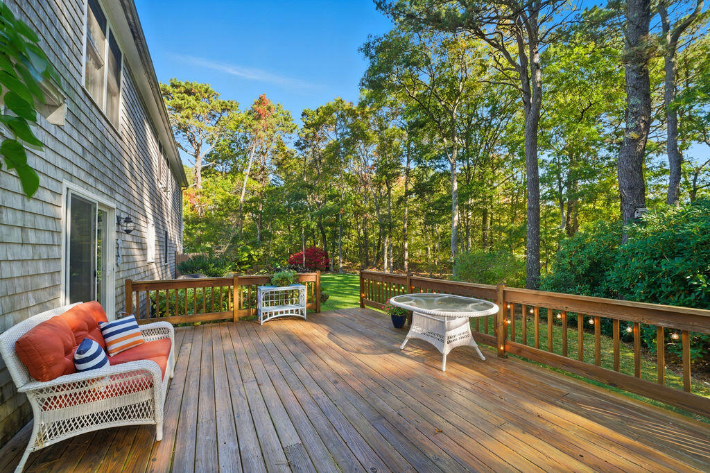 42 Eventide Lane Hyannis, MA 02601 - Photo 16 of 39 a balcony with wooden floor and outdoor seating