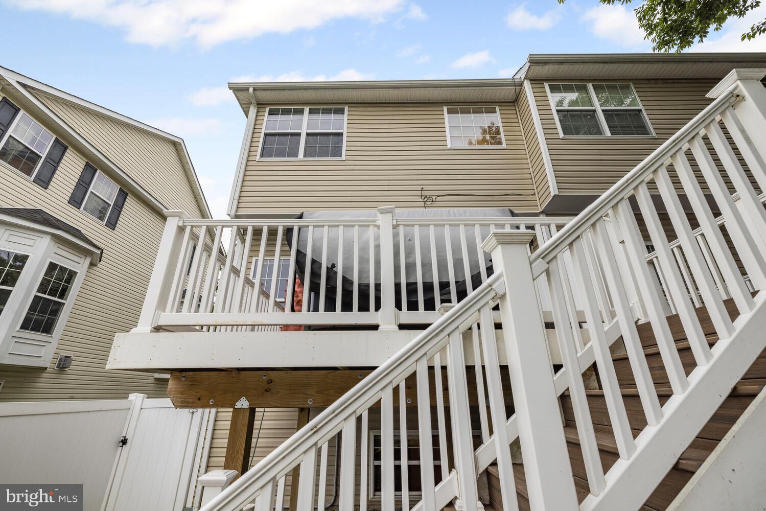 3334 Castle Ridge Circle, Unit 8 Silver Spring, MD 20904 - Photo 25 of 32 a view of wooden house with a deck