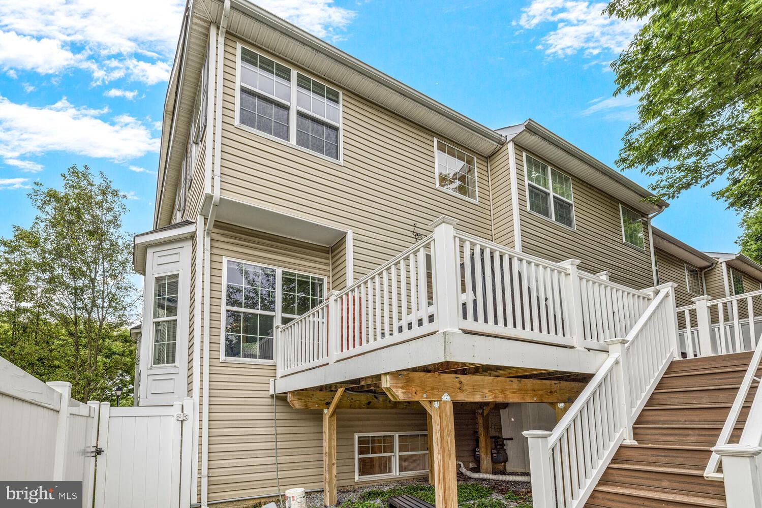 3334 Castle Ridge Circle, Unit 8 Silver Spring, MD 20904 - Photo 26 of 32 a front view of a house with a balcony