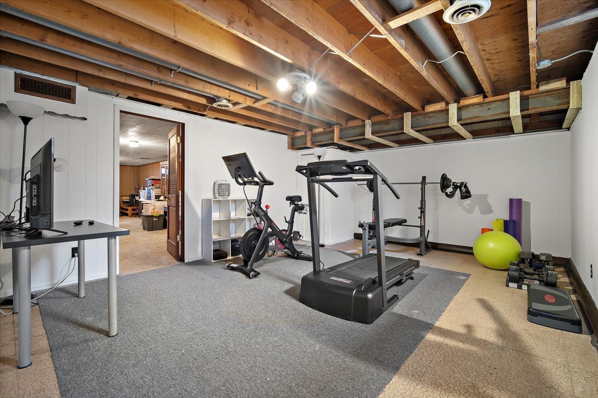 203 South Cottage Avenue Normal, IL 61761 - Photo 19 of 25 a view of a room with gym equipment