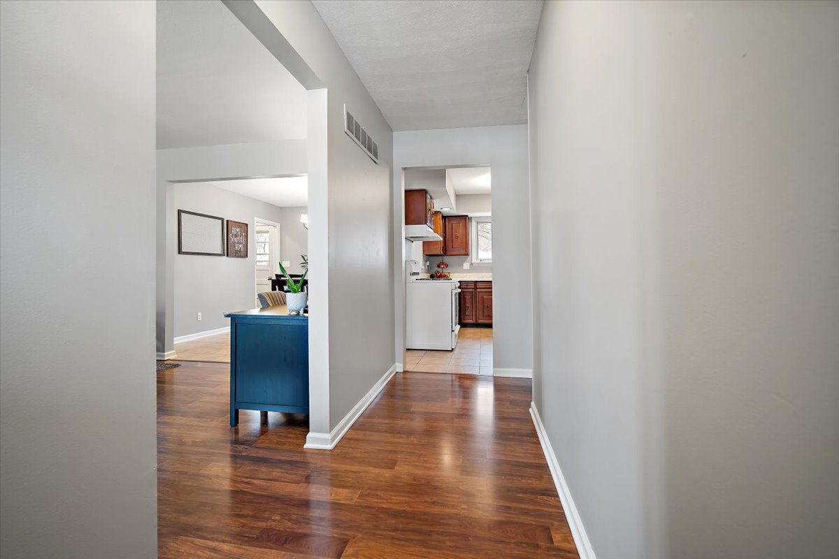 203 South Cottage Avenue Normal, IL 61761 - Photo 5 of 25 a view of a kitchen from the hallway