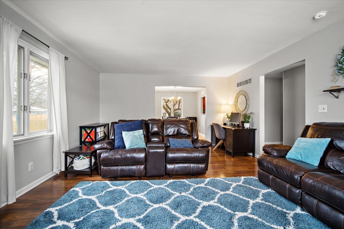 203 South Cottage Avenue Normal, IL 61761 - Photo 7 of 25 a living room with furniture and wooden floor