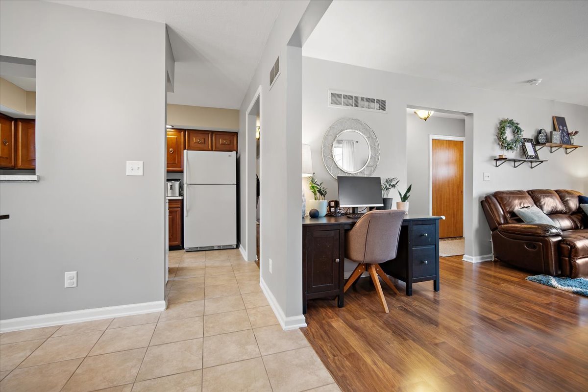 203 South Cottage Avenue Normal, IL 61761 - Photo 10 of 25 a living room with furniture and a mirror