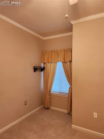 an empty room with a staircase