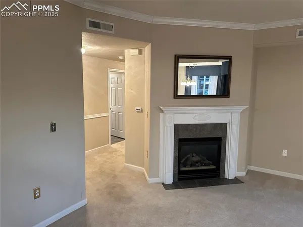 a living room with a fireplace