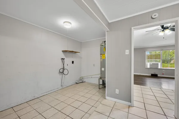 a view of a livingroom with a furniture and window
