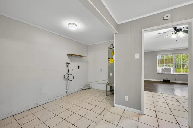 a view of a livingroom with a furniture and window