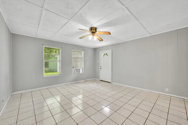 a view of an empty room with a window