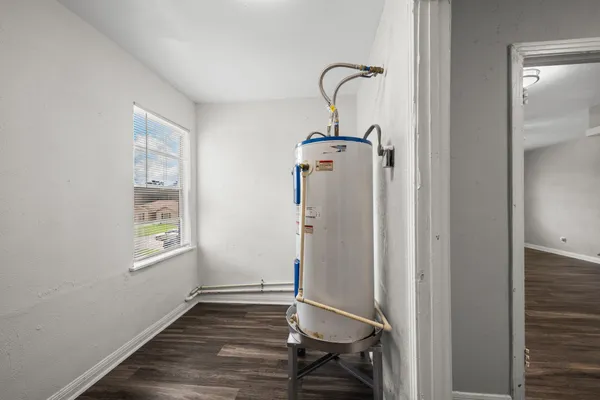 a very nice looking room with wooden floor