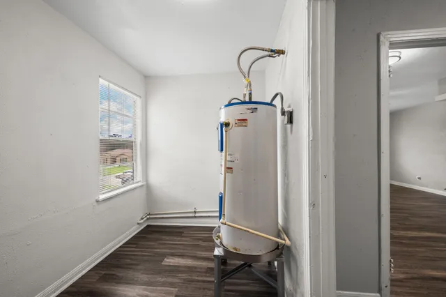 a very nice looking room with wooden floor