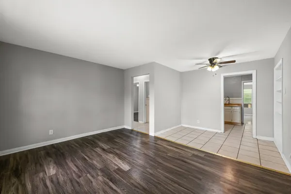 a view of a livingroom with wooden floor