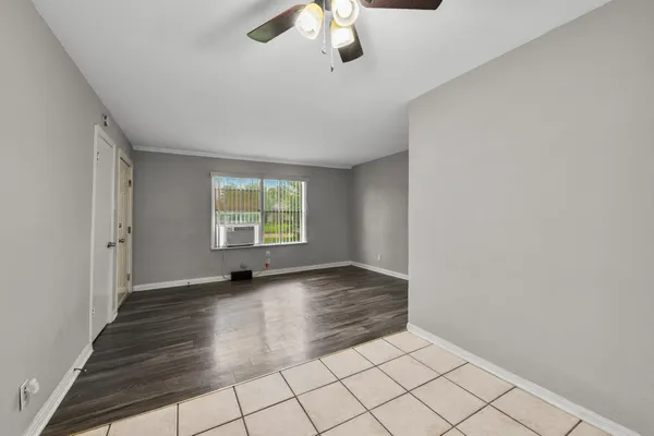 a view of an empty room with a window