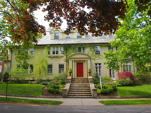 18 Willard Road Brookline, MA 02445 - Photo 1 of 14 a front view of a house with garden