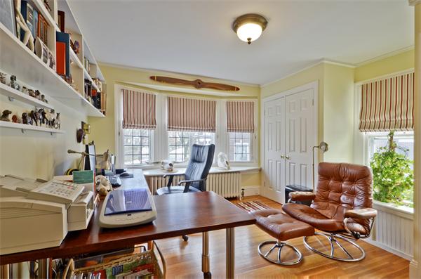 18 Willard Road Brookline, MA 02445 - Photo 11 of 14 a view of a dining room with furniture window and wooden floor