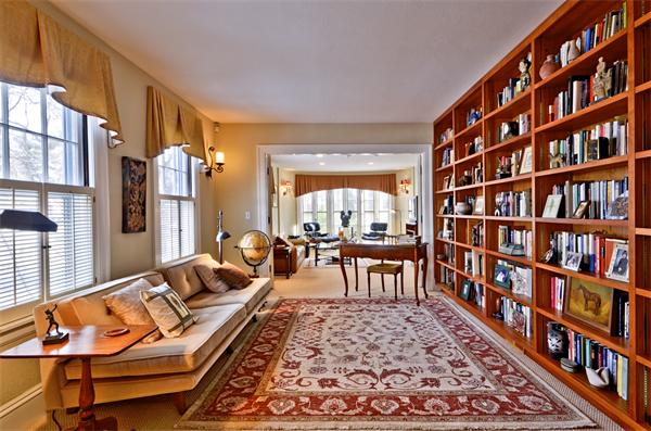 18 Willard Road Brookline, MA 02445 - Photo 3 of 14 a living room with furniture and a book shelf