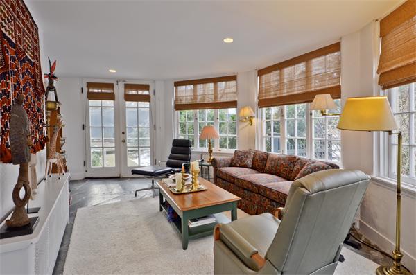18 Willard Road Brookline, MA 02445 - Photo 7 of 14 a living room with furniture and a floor to ceiling window