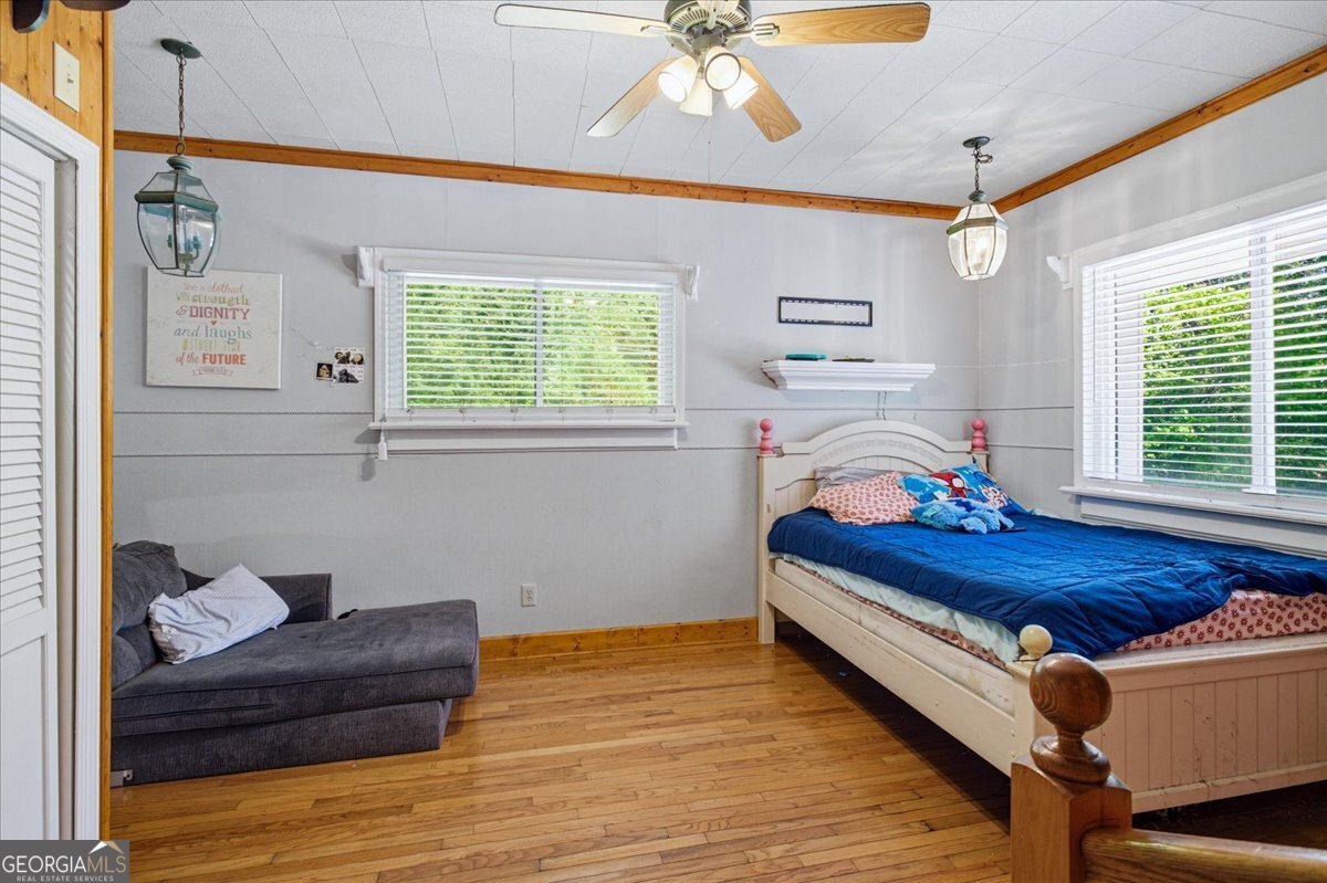 3270 Rex Road Rex, GA 30273 - Photo 16 of 35 a bed room with furniture and a window
