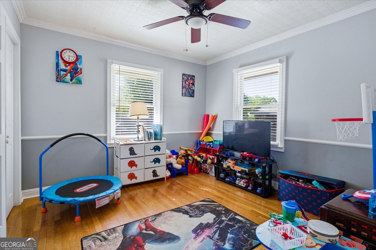 3270 Rex Road Rex, GA 30273 - Photo 19 of 35 a room with furniture and a window