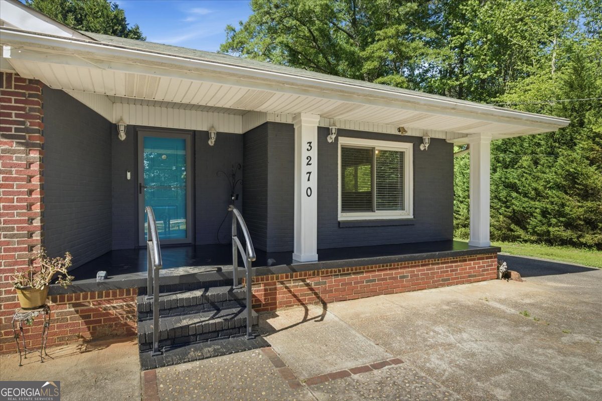 3270 Rex Road Rex, GA 30273 - Photo 2 of 35 a view of house with outdoor space