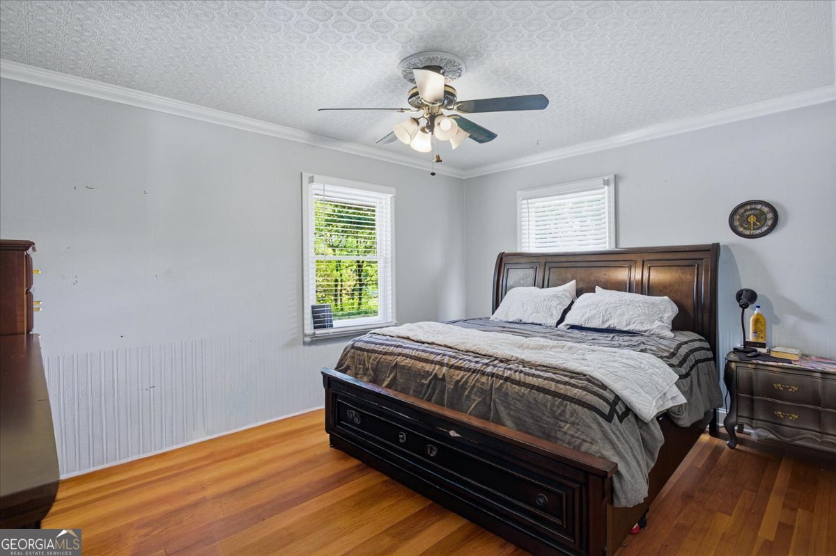 3270 Rex Road Rex, GA 30273 - Photo 21 of 35 a bedroom with a bed and window