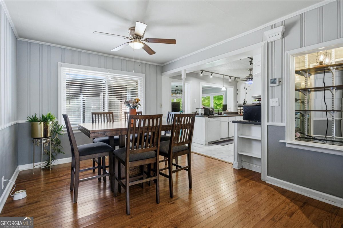 3270 Rex Road Rex, GA 30273 - Photo 6 of 35 a view of a dining room with furniture and wooden floor