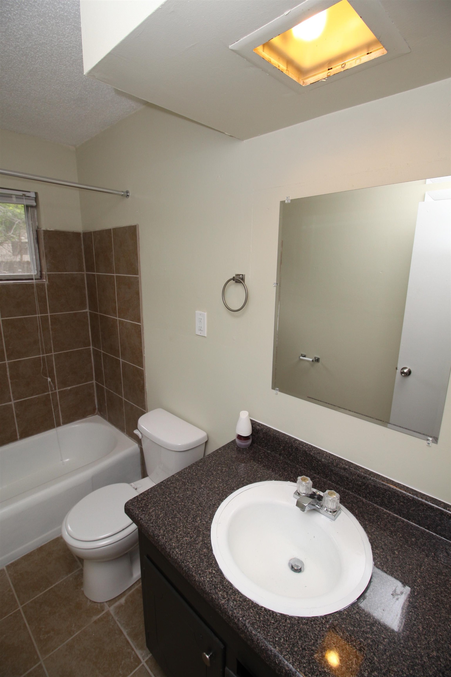 5190 Cottonwood Road Memphis, TN 38118 - Photo 14 of 26 a bathroom with a sink a toilet and shower