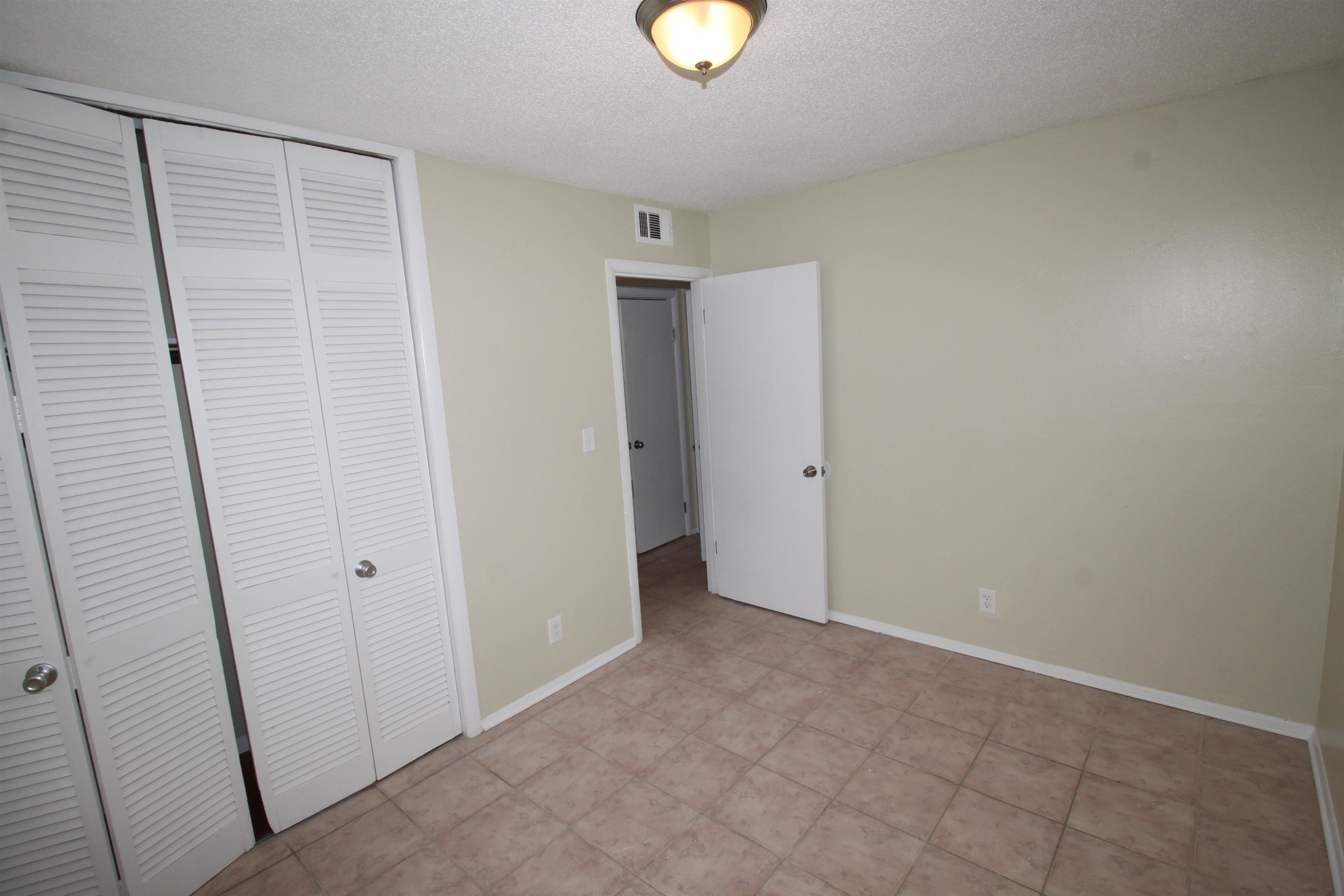 5190 Cottonwood Road Memphis, TN 38118 - Photo 17 of 26 wooden floor in an empty room