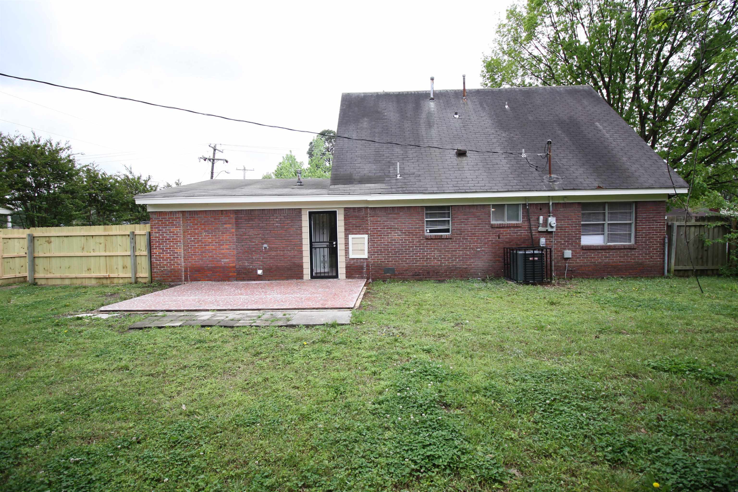 5190 Cottonwood Road Memphis, TN 38118 - Photo 2 of 26 an aerial view of a house with a garden
