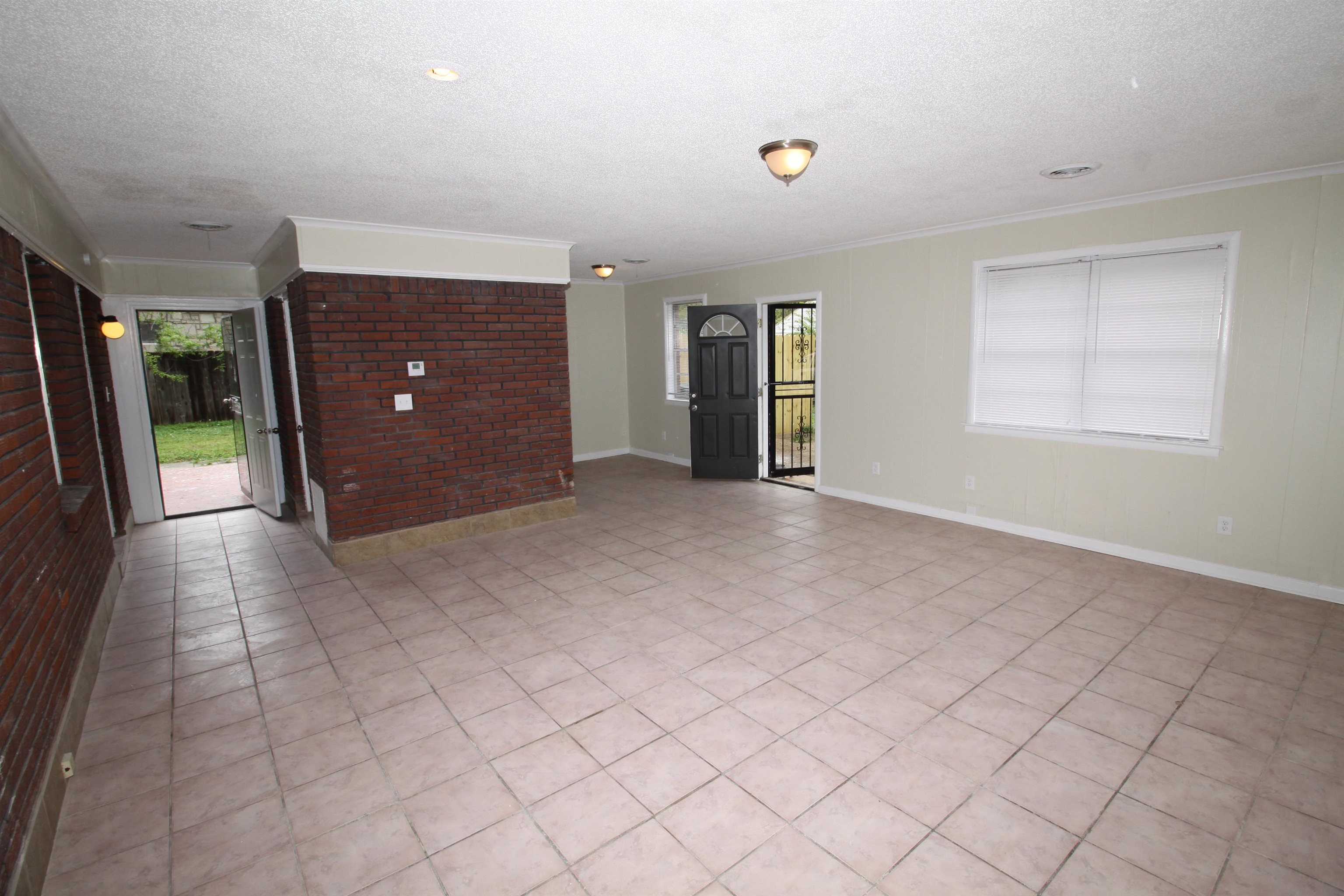 5190 Cottonwood Road Memphis, TN 38118 - Photo 7 of 26 an empty room with windows